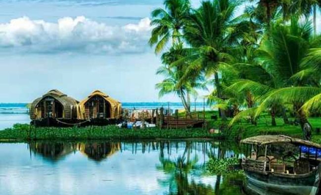 Traditional houseboat cruising on the tranquil Kerala backwaters